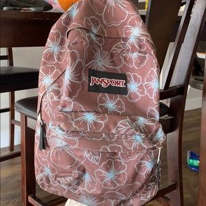 Jansport Brown and Teal Hawaiian Flower backpack